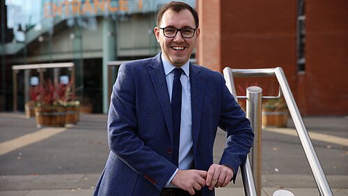 A picture of Tom Gordon MP outside Harrogate Convention Centre